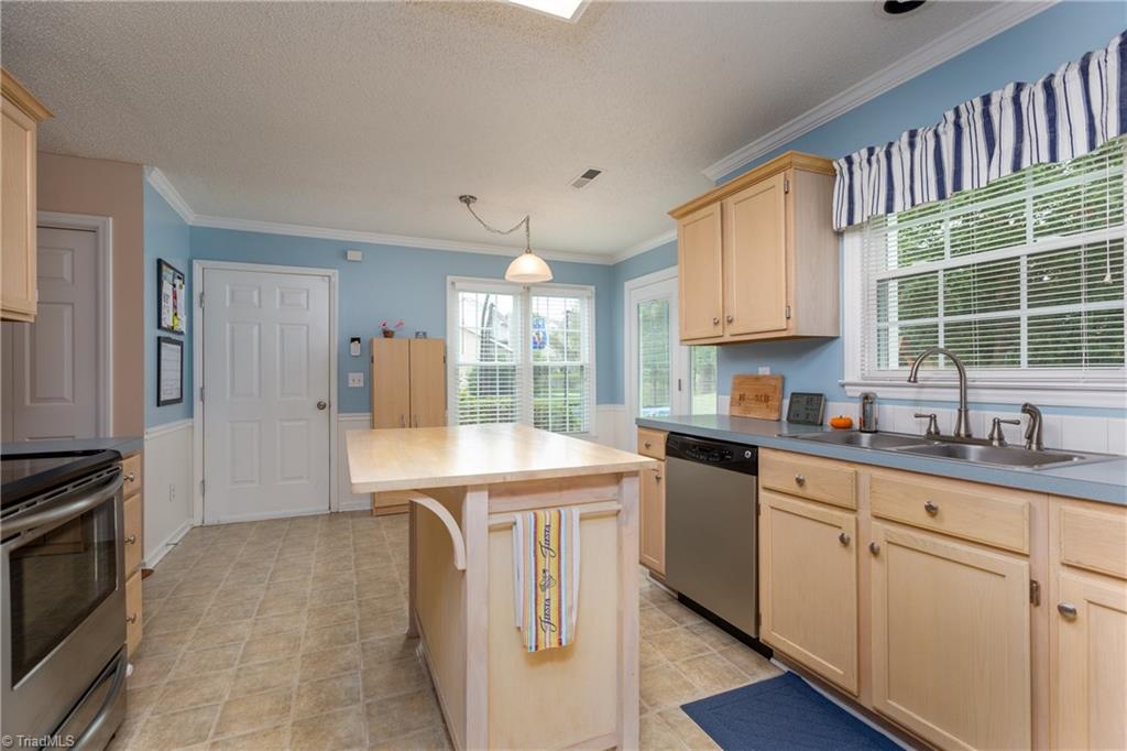 3310 Timberwolf Avenue High Point, NC 27265 - Photo 8 of 24 EAT IN KITCHEN WITH NATURAL LIGHT AND ROOM TO PREPARE MEALS