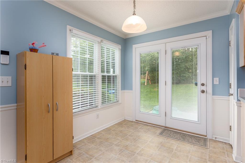 3310 Timberwolf Avenue High Point, NC 27265 - Photo 10 of 24 NEWER FRENCH DOORS WITH BUILT IN BLINDS IN DINETTE AREA