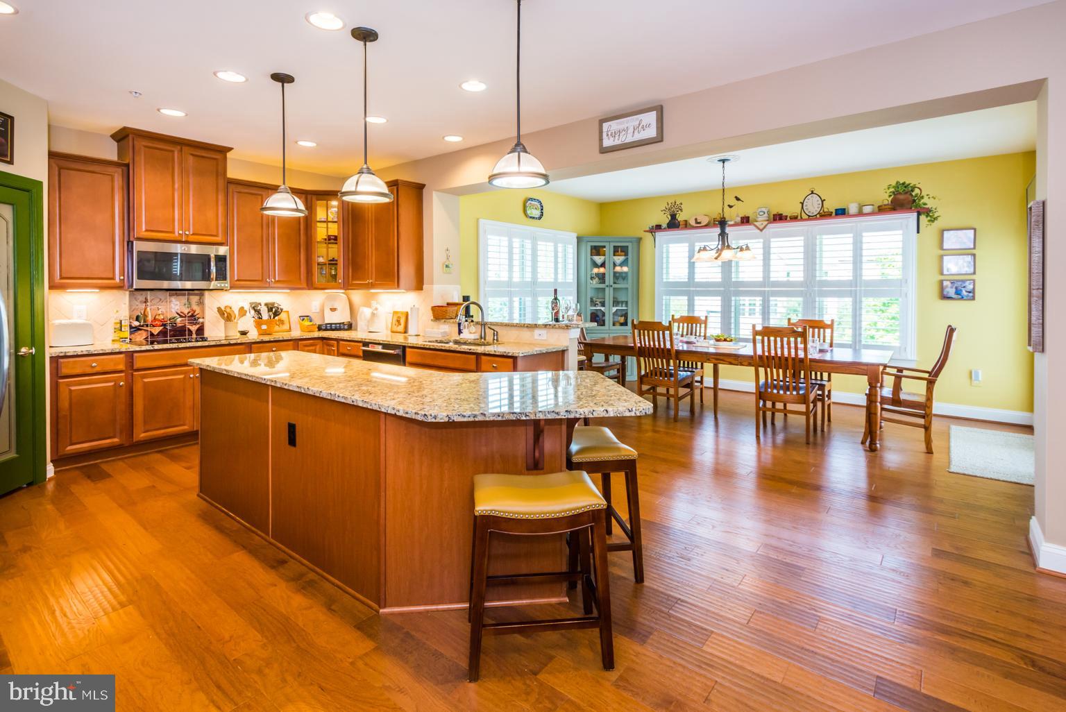 9752 Powder Hall Road Perry Hall, MD 21128 - Photo 21 of 129 KITCHEN ISLAND - MORNING ROOM IN BACKGROUND