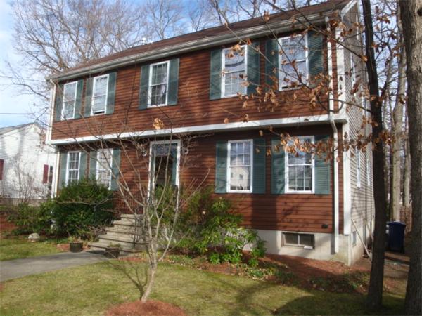 106 Desoto Road Boston, MA 02132 - Photo 27 of 27 a front view of a house with garden