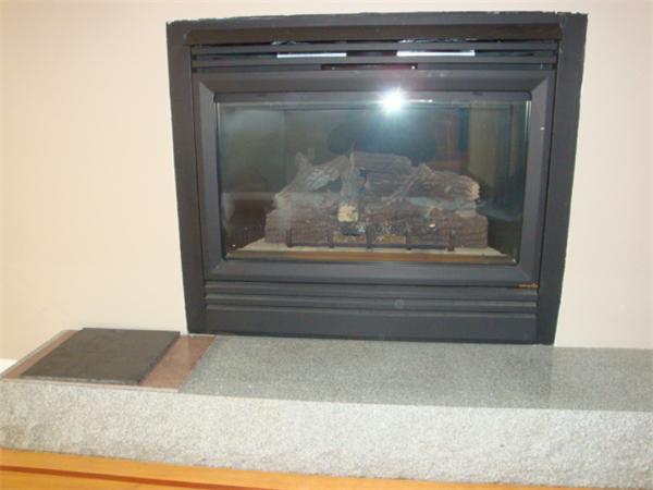 106 Desoto Road Boston, MA 02132 - Photo 9 of 27 a close view of fireplace
