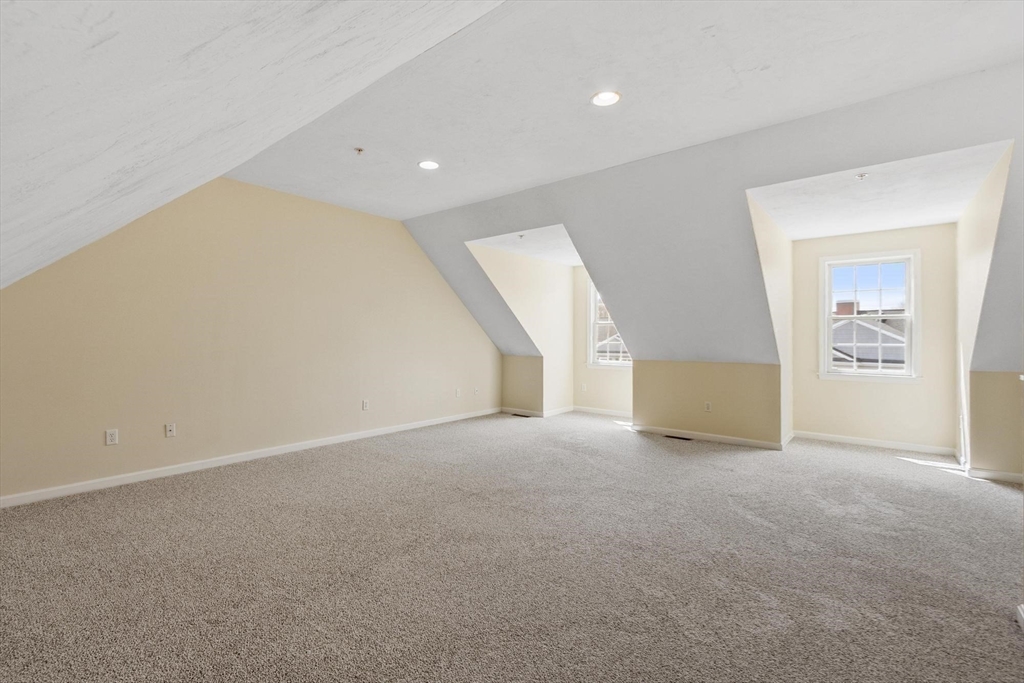 1975 Middlesex Street, Unit 33 Lowell, MA 01851 - Photo 11 of 18 a view of an empty room with a window