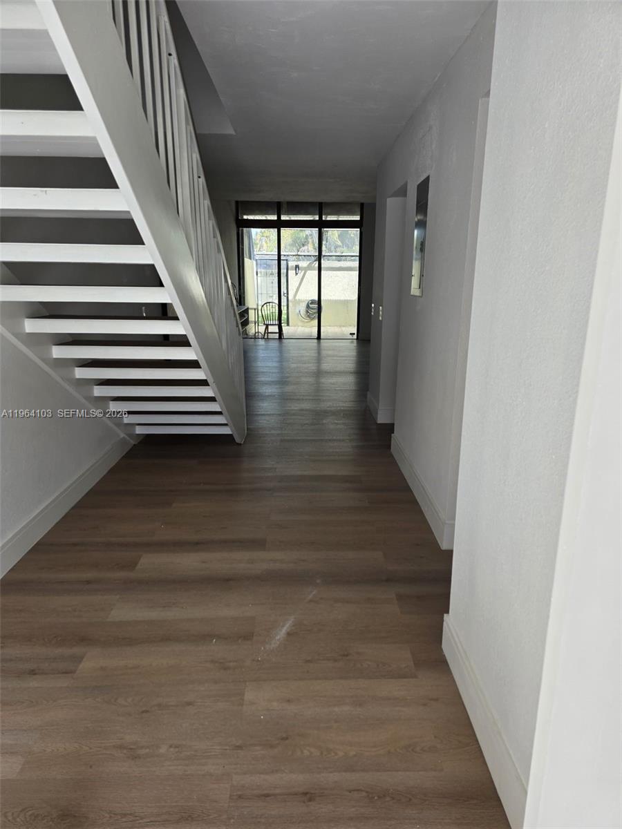 10951 Cypress Road, Unit 10951 Pembroke Pines, FL 33026 - Photo 11 of 27 a view of entryway and hall with wooden floor