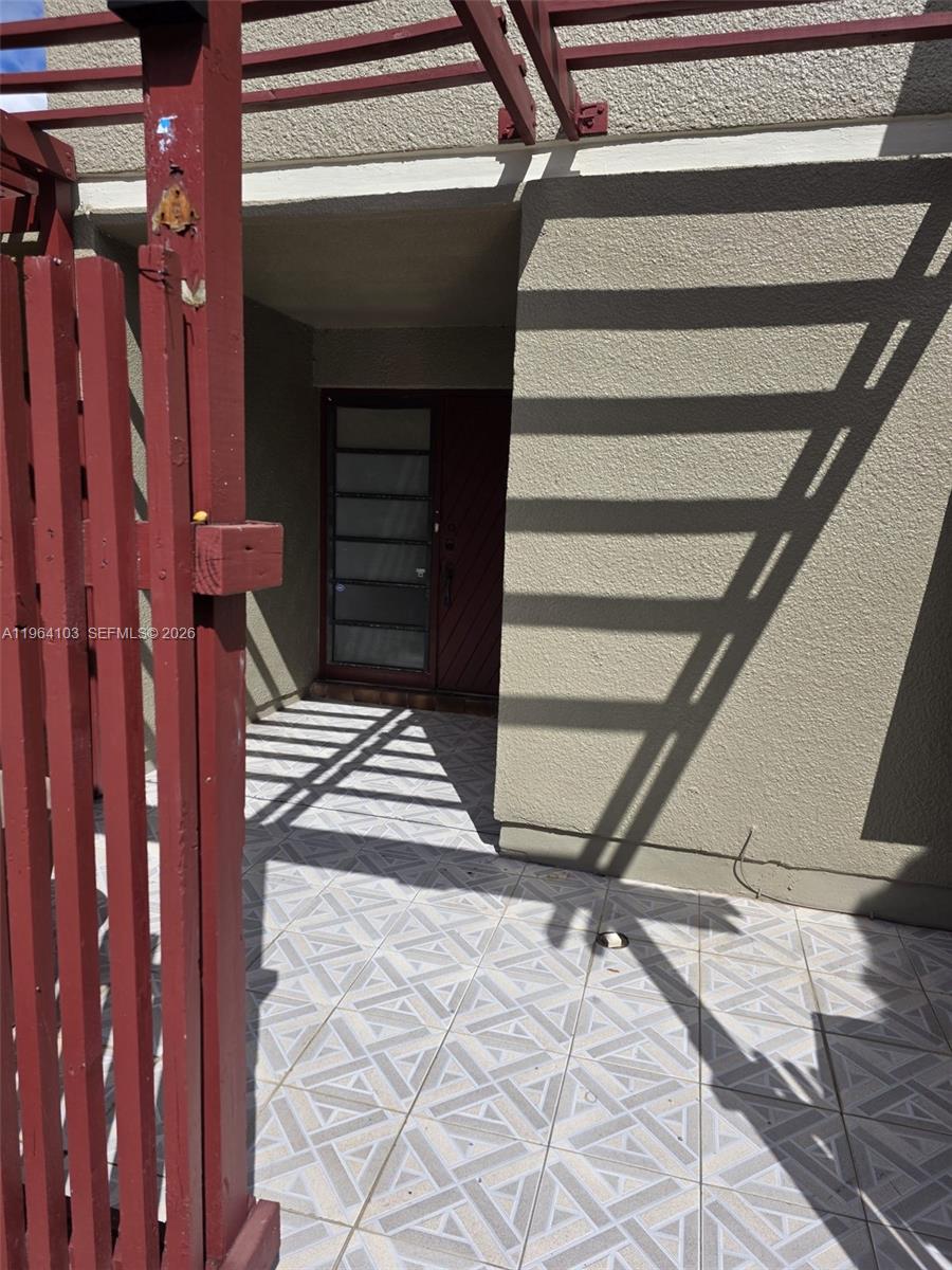 10951 Cypress Road, Unit 10951 Pembroke Pines, FL 33026 - Photo 2 of 27 a view of walk in closet with stairs