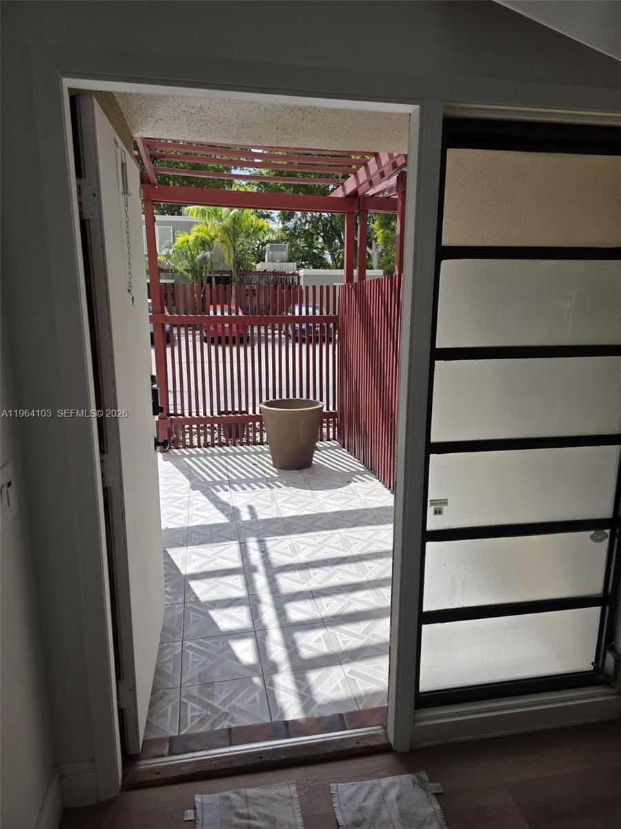 10951 Cypress Road, Unit 10951 Pembroke Pines, FL 33026 - Photo 3 of 27 a view of a porch