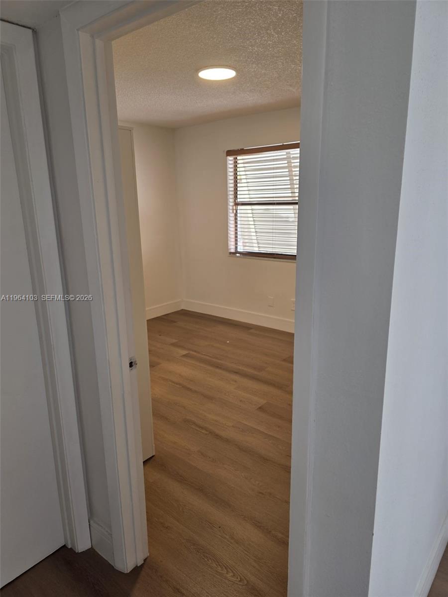 10951 Cypress Road, Unit 10951 Pembroke Pines, FL 33026 - Photo 7 of 27 a view of walk in closet