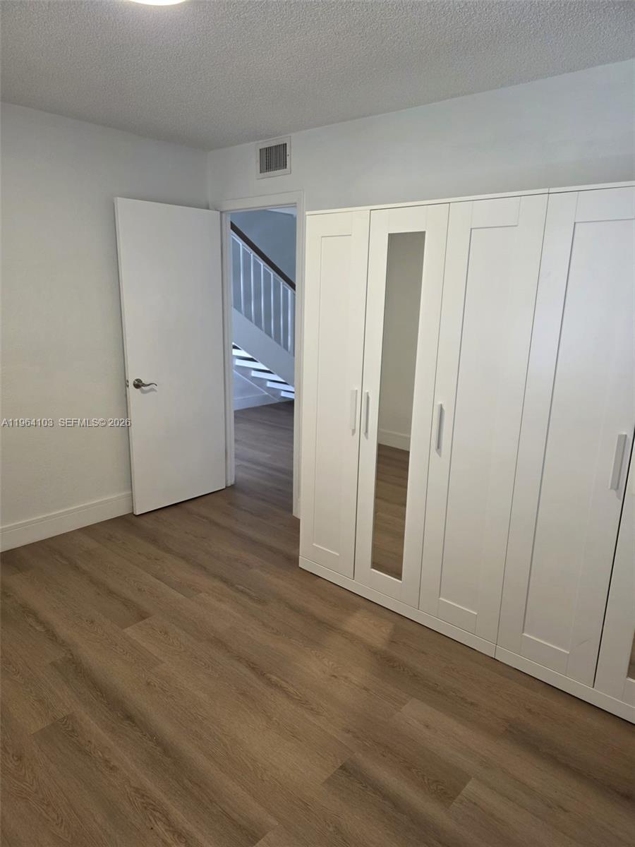 10951 Cypress Road, Unit 10951 Pembroke Pines, FL 33026 - Photo 10 of 27 a view of entryway with wooden floor