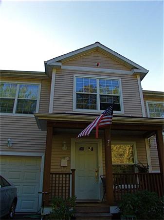 32 Junction Street, Unit 2 Needham, MA 02492 - Photo 1 of 17 a front view of a house with parking