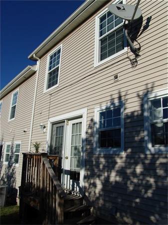 32 Junction Street, Unit 2 Needham, MA 02492 - Photo 17 of 17 a view of a house with backyard and sitting area