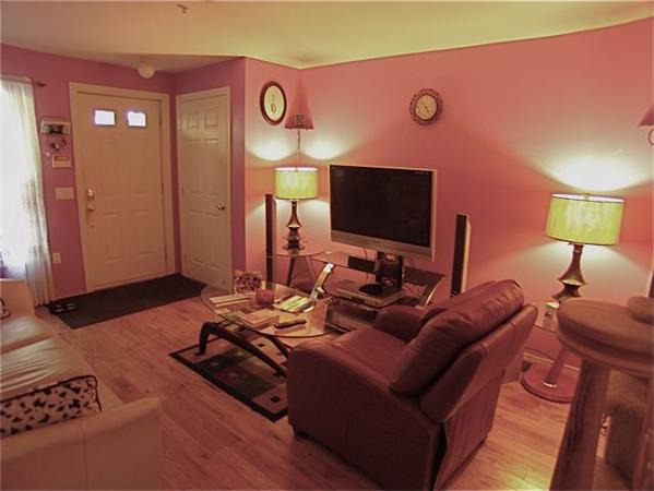 32 Junction Street, Unit 2 Needham, MA 02492 - Photo 7 of 17 a living room with furniture and a flat screen tv