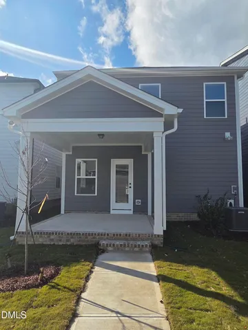 a view of a house with swimming pool