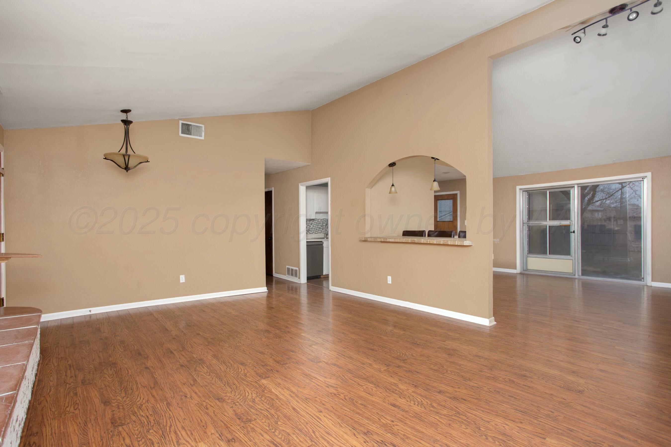 3621 Thurman Street Amarillo, TX 79109 - Photo 6 of 29 a view of a kitchen with a sink and a window