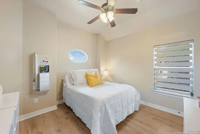 a bedroom with a bed and closet