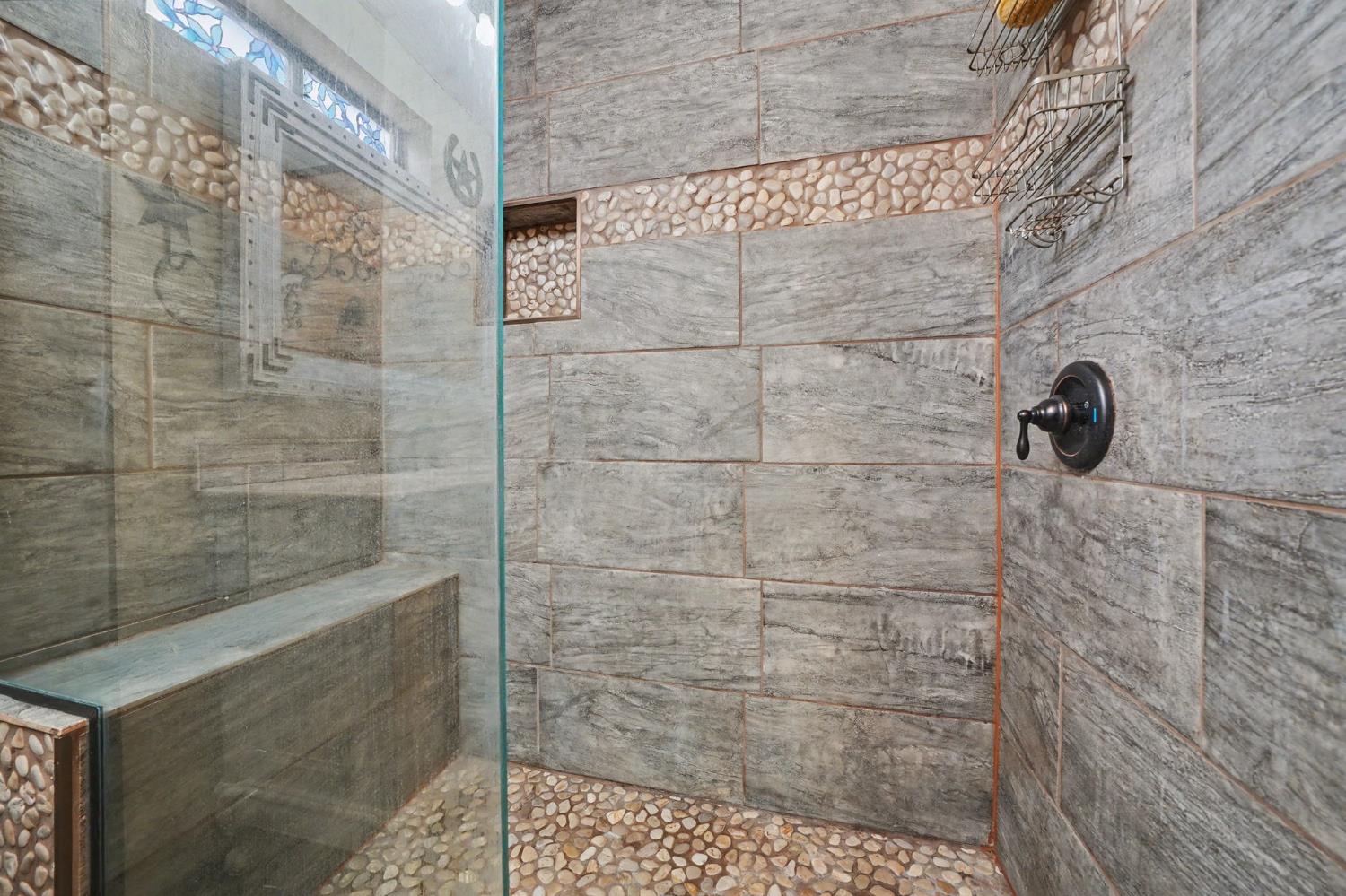 4821 Old Emigrant Trail East Mountain Ranch, CA 95246 - Photo 25 of 65 a bathroom with a shower