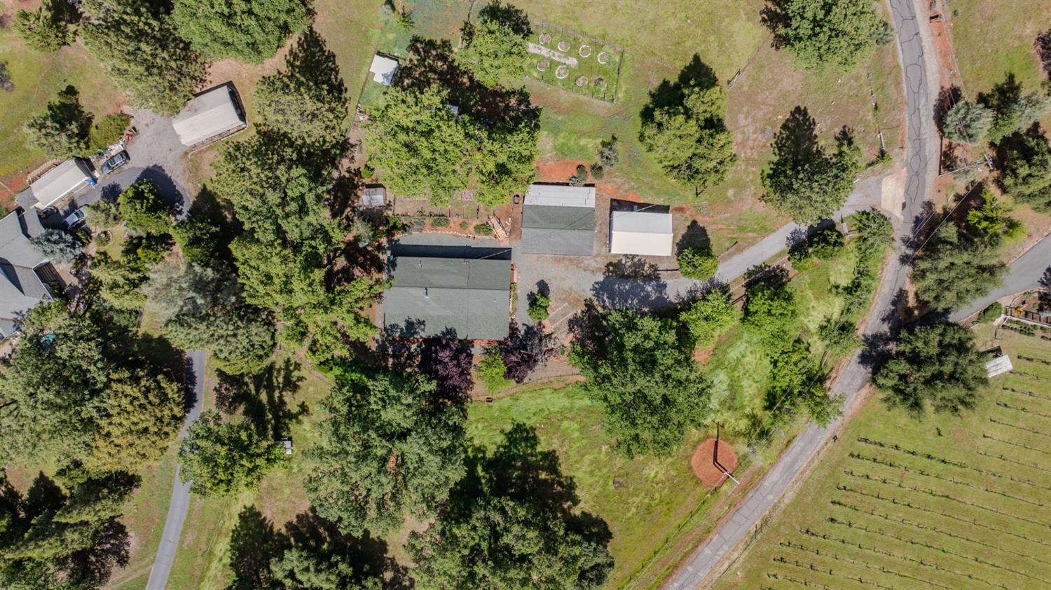 4821 Old Emigrant Trail East Mountain Ranch, CA 95246 - Photo 52 of 65 an aerial view of a house with a yard