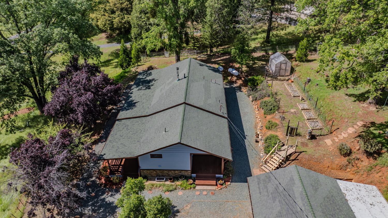 4821 Old Emigrant Trail East Mountain Ranch, CA 95246 - Photo 60 of 65 an aerial view of a house with a yard