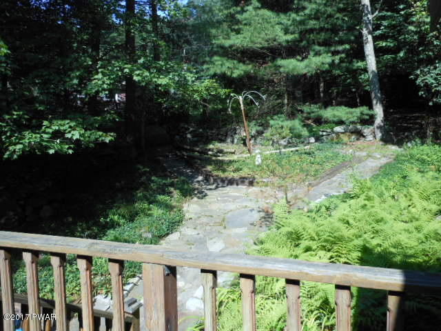 207 Aspen Road Dingmans Ferry, PA 18328 - Photo 3 of 22 a view of a balcony with a yard