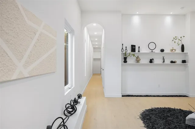 a bathroom with a bathtub and shower