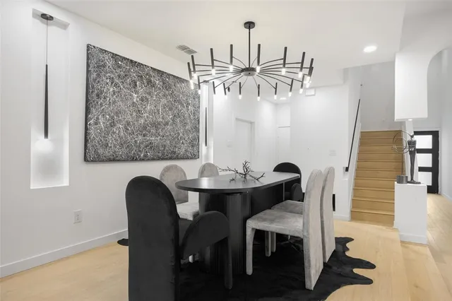 a view of a dining room with furniture
