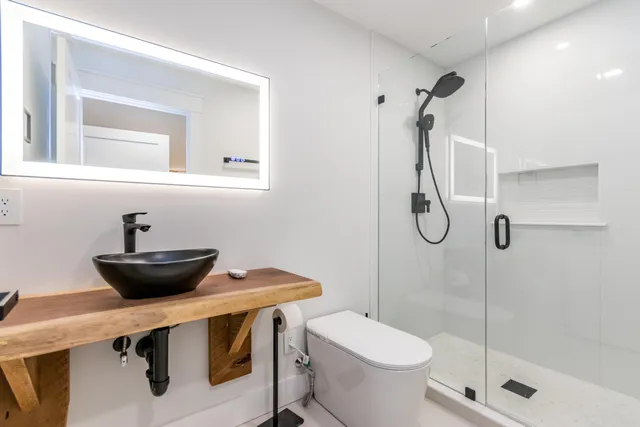 a bedroom with a bed and a couch