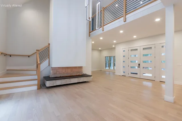 a living room with furniture and a table