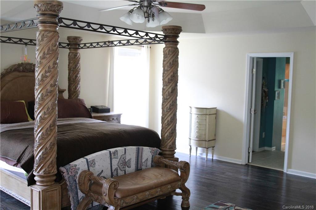 285 Choate Avenue Fort Mill, SC 29708 - Photo 14 of 24 a living room with furniture and a chandelier