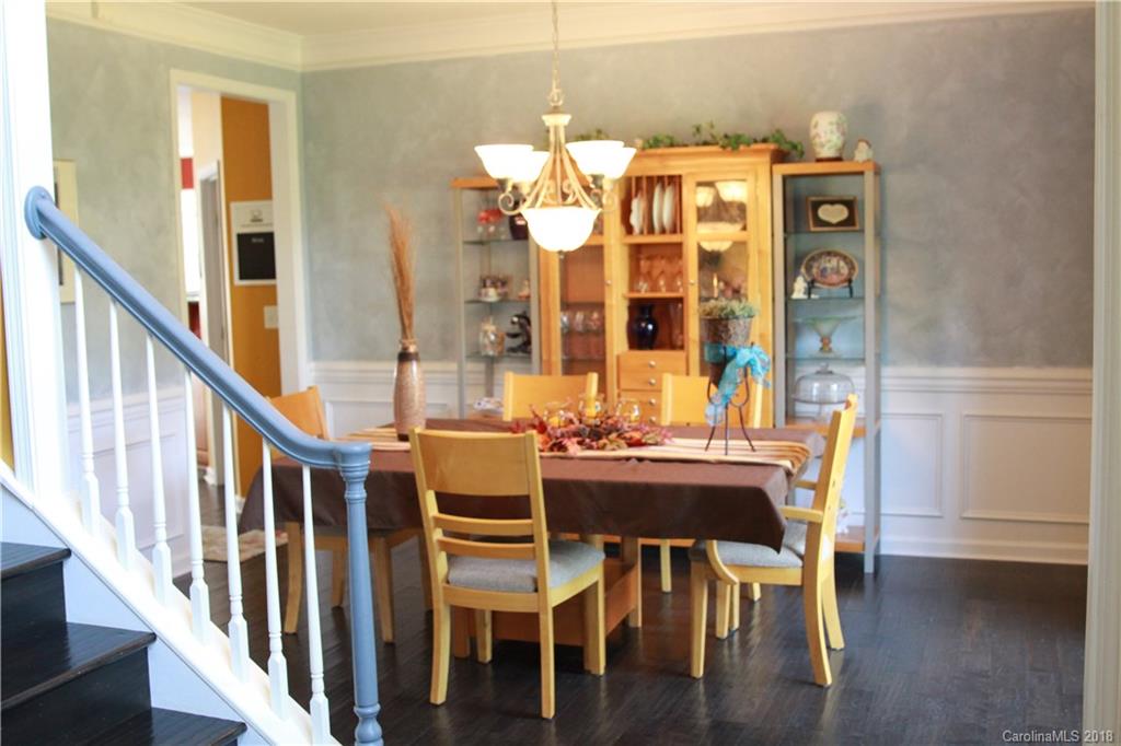 285 Choate Avenue Fort Mill, SC 29708 - Photo 5 of 24 a view of a dining room with furniture and wooden floor