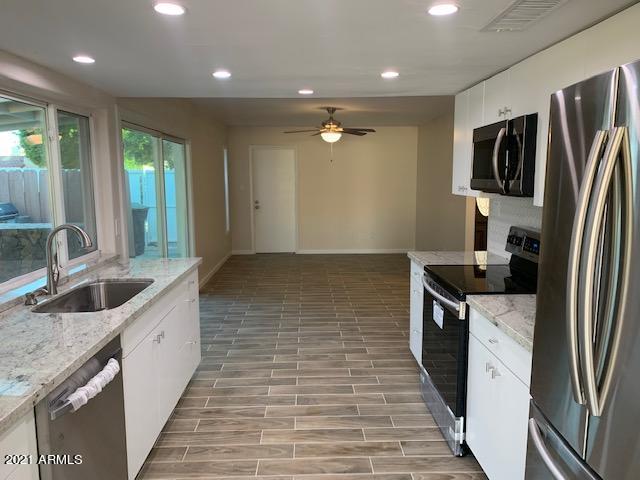 4028 West Griswold Road Phoenix, AZ 85051 - Photo 5 of 17 IMG_9951