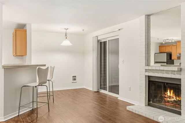 a workspace with furniture and a fireplace