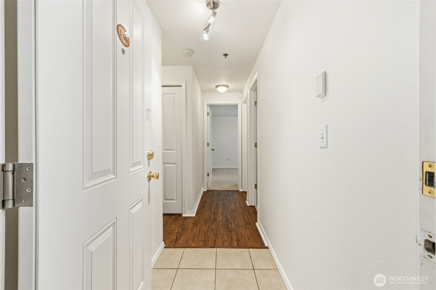 11527 Highway 99, Unit C106 Everett, WA 98204 - Photo 17 of 21 a bathroom with a sink and shower
