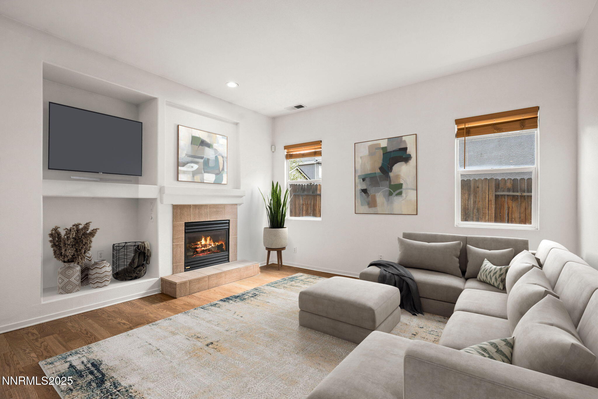 10452 Copper Wood Court Reno, NV 89521 - Photo 13 of 30 a living room with furniture window and a fireplace