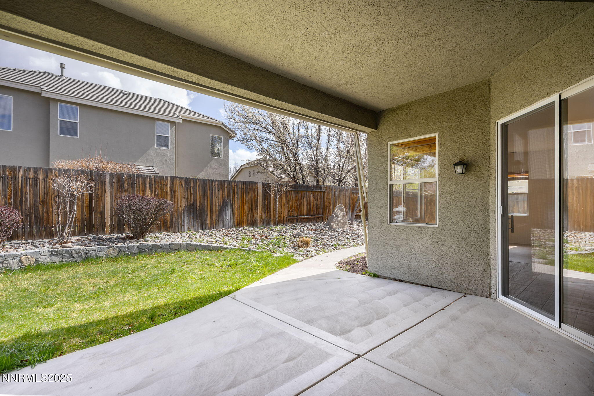 10452 Copper Wood Court Reno, NV 89521 - Photo 29 of 30 a view of a house with backyard and porch