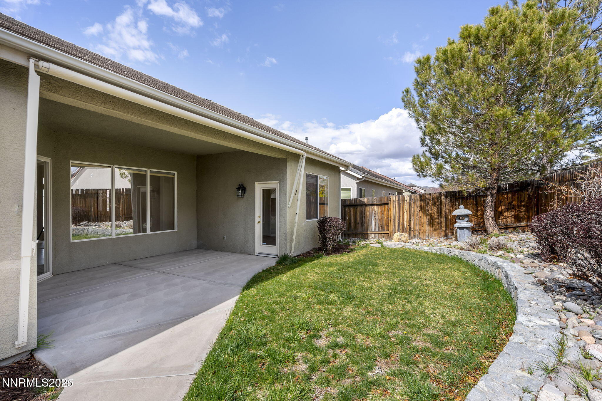 10452 Copper Wood Court Reno, NV 89521 - Photo 30 of 30 a front view of a house with a garden