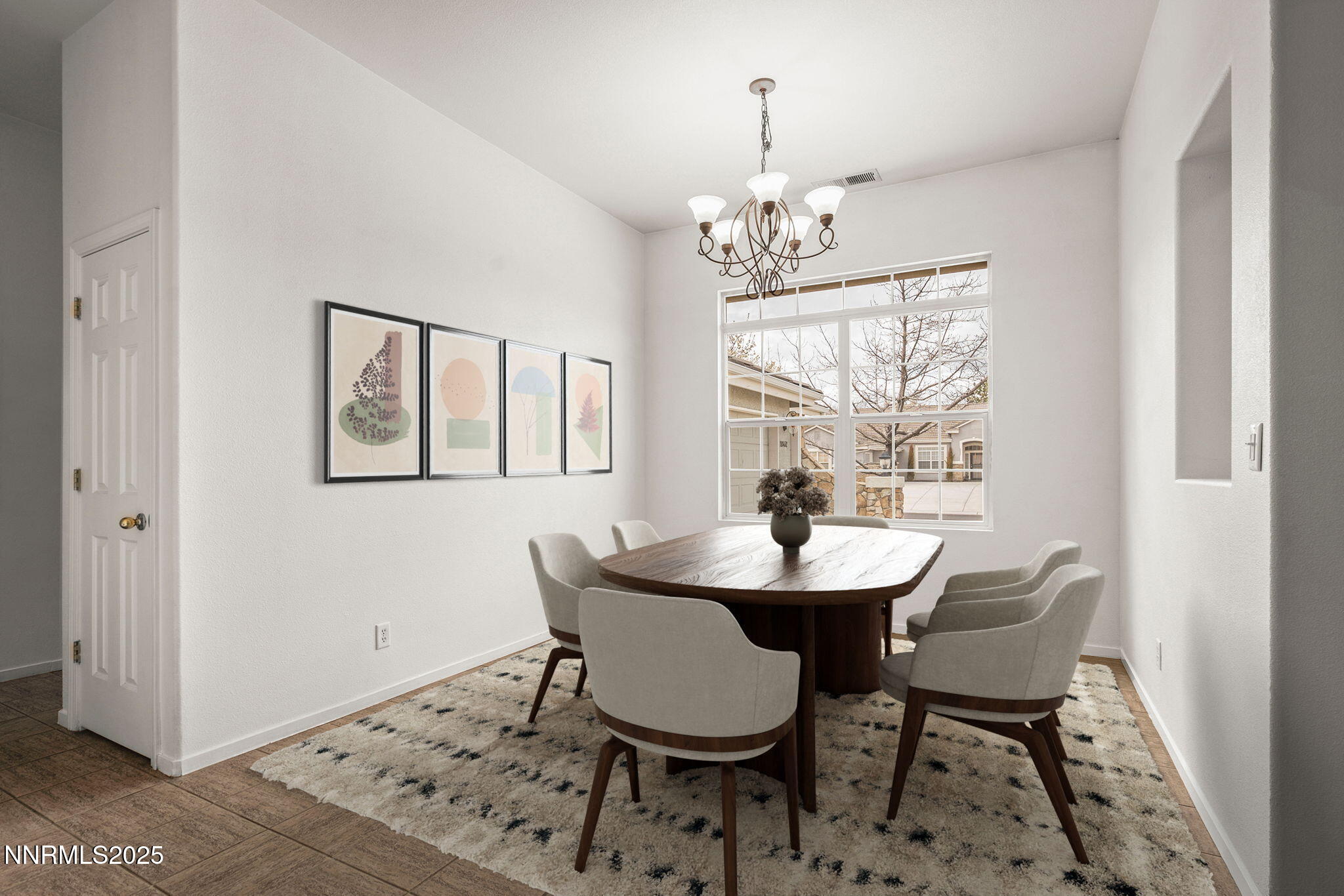10452 Copper Wood Court Reno, NV 89521 - Photo 9 of 30 a view of a dining room with furniture and window