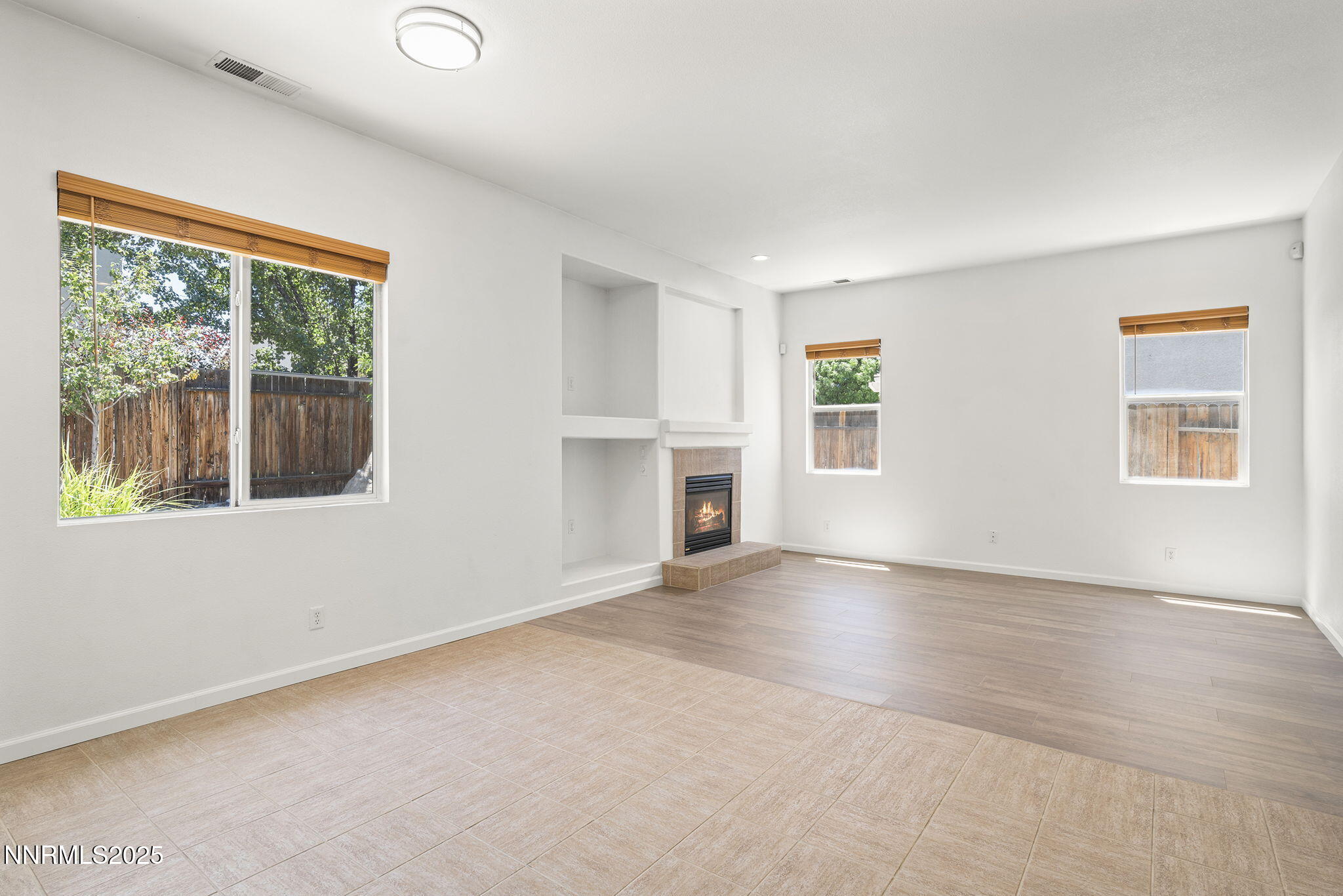 10452 Copper Wood Court Reno, NV 89521 - Photo 10 of 30 a view of an empty room with a window