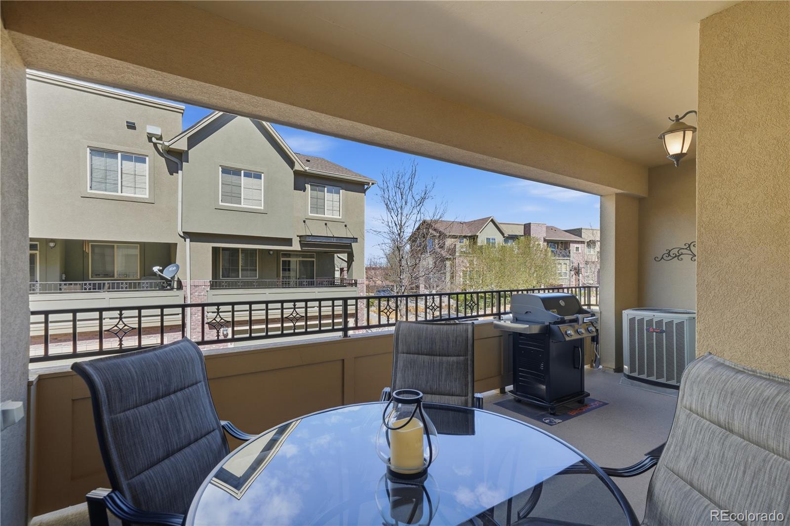 950 Elmhurst Drive, Unit C Highlands Ranch, CO 80129 - Photo 12 of 31 a view of a workspace with furniture and a window
