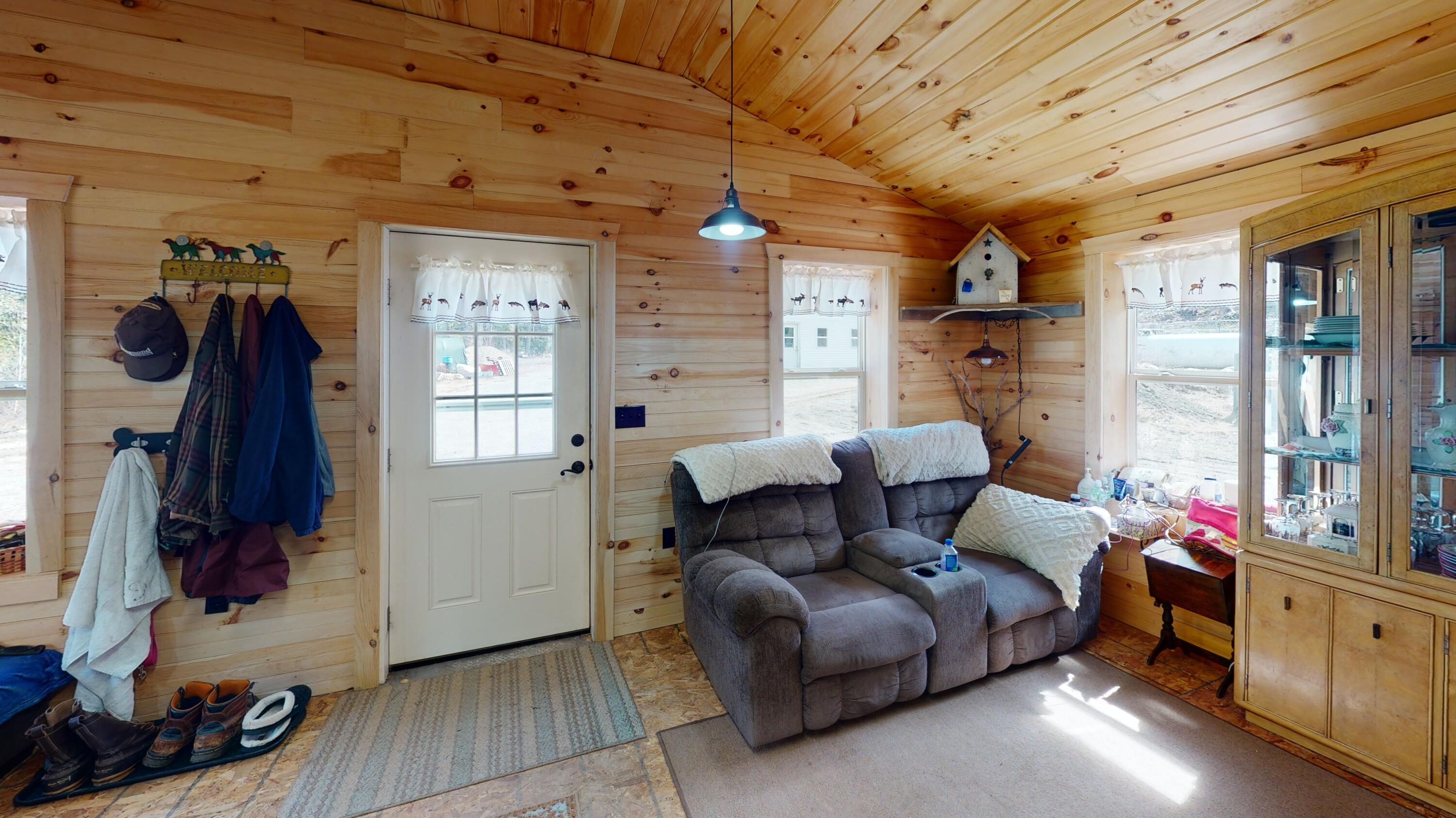 338 Weatherbee Pt Road Lincoln, ME 04457 - Photo 11 of 26 10. Living Room 2