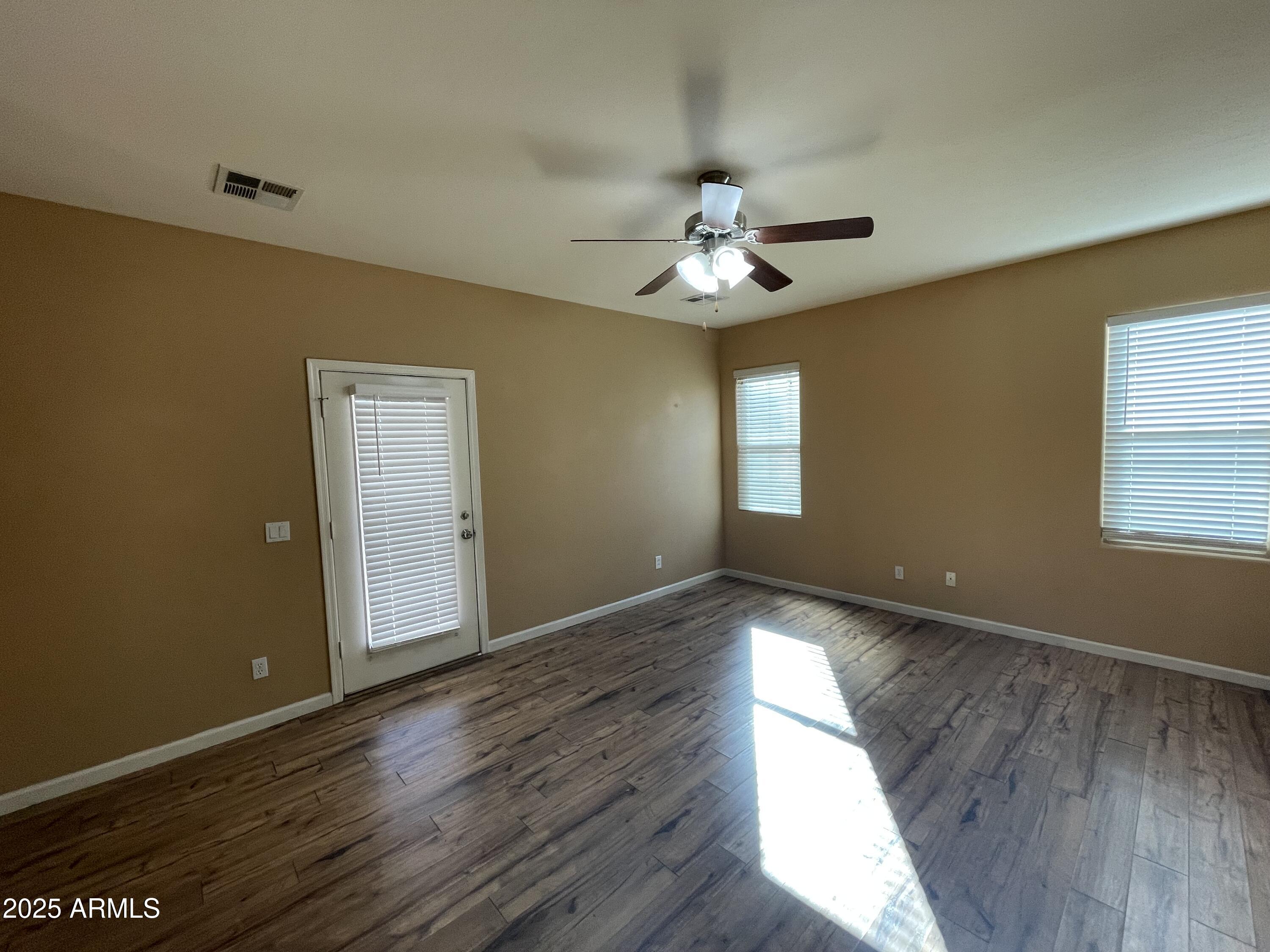 1441 East Thornton Avenue Gilbert, AZ 85297 - Photo 7 of 13 a view of entryway with wooden floor