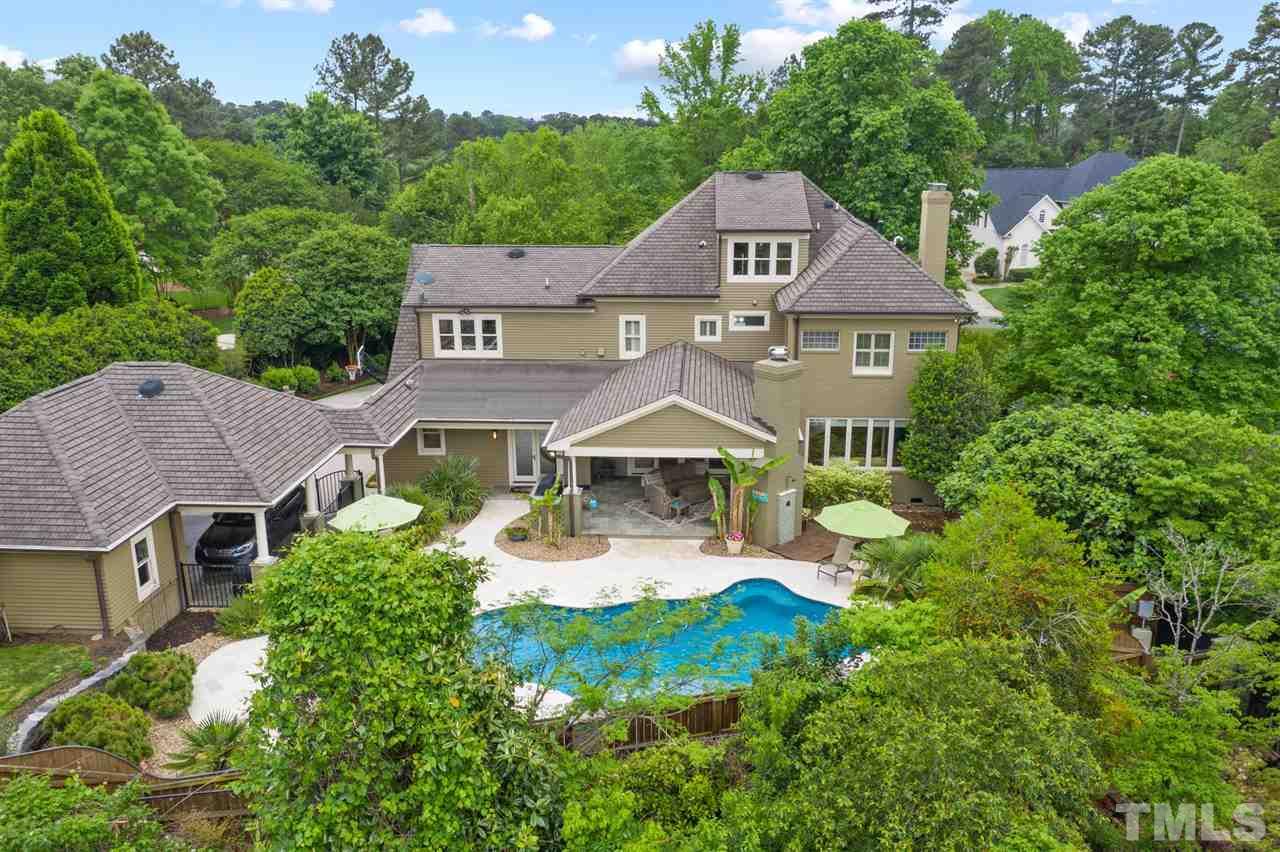 4028 John S Raboteau Wynd Raleigh, NC 27612 - Photo 30 of 30 an aerial view of a house with yard and green space