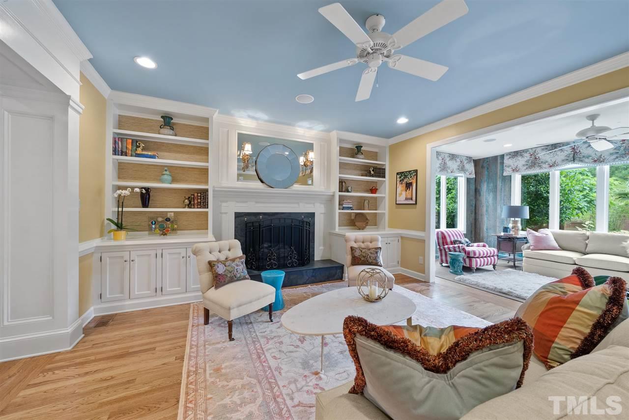 4028 John S Raboteau Wynd Raleigh, NC 27612 - Photo 6 of 30 a living room with furniture and a fireplace