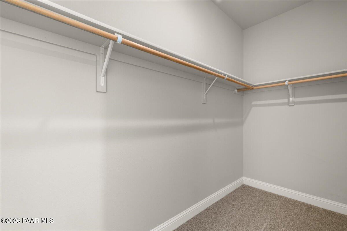 7366 East Bunkhouse Road Prescott Valley, AZ 86315 - Photo 20 of 25 a view of a room with racks on the wall