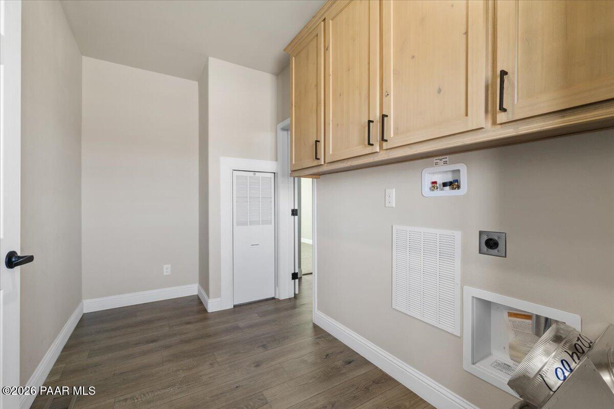 7366 East Bunkhouse Road Prescott Valley, AZ 86315 - Photo 25 of 25 a view of cabinets with wooden floor