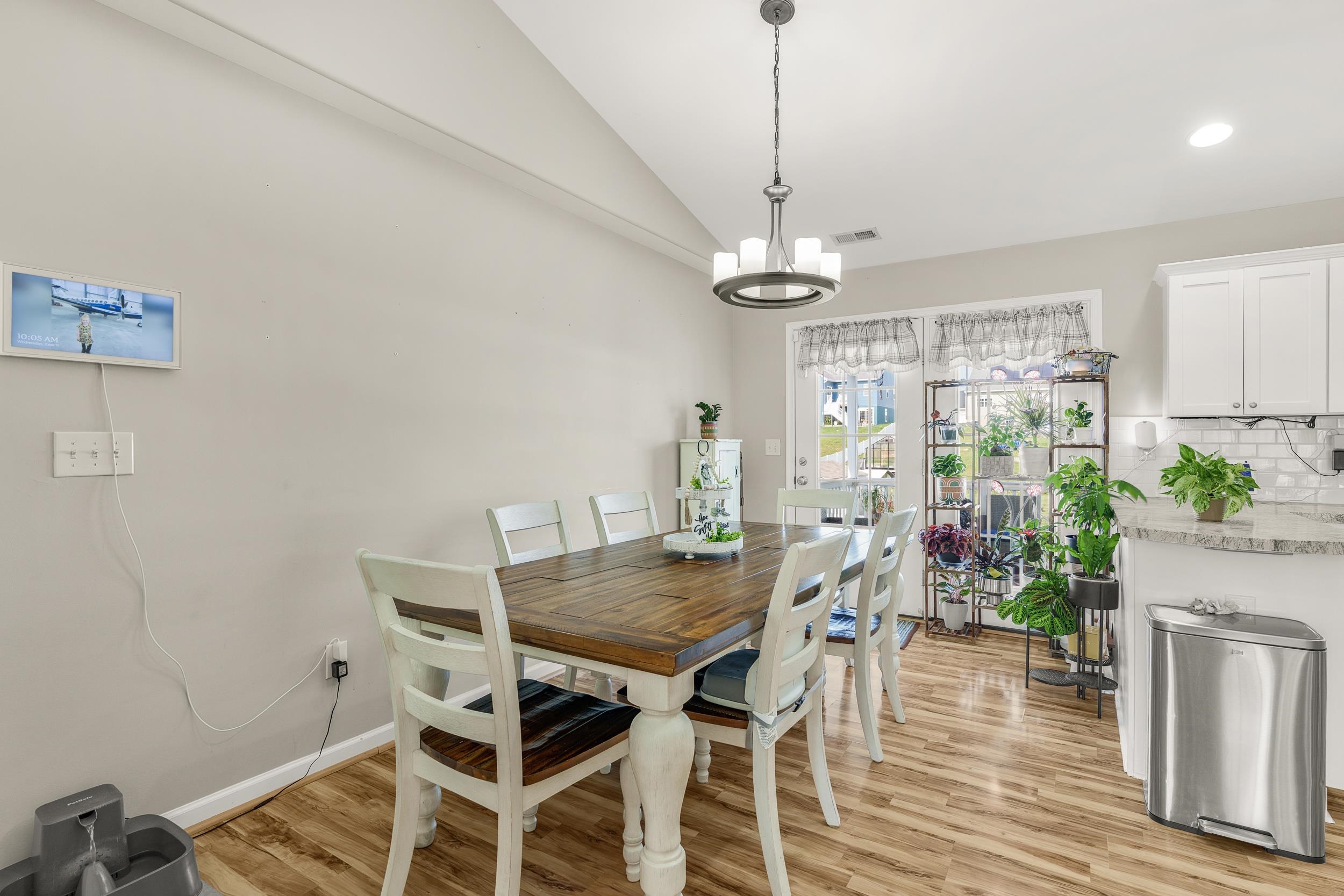 96 Lofty Circle Stuarts Draft, VA 24477 - Photo 17 of 69 a view of a dining room with furniture window and wooden floor