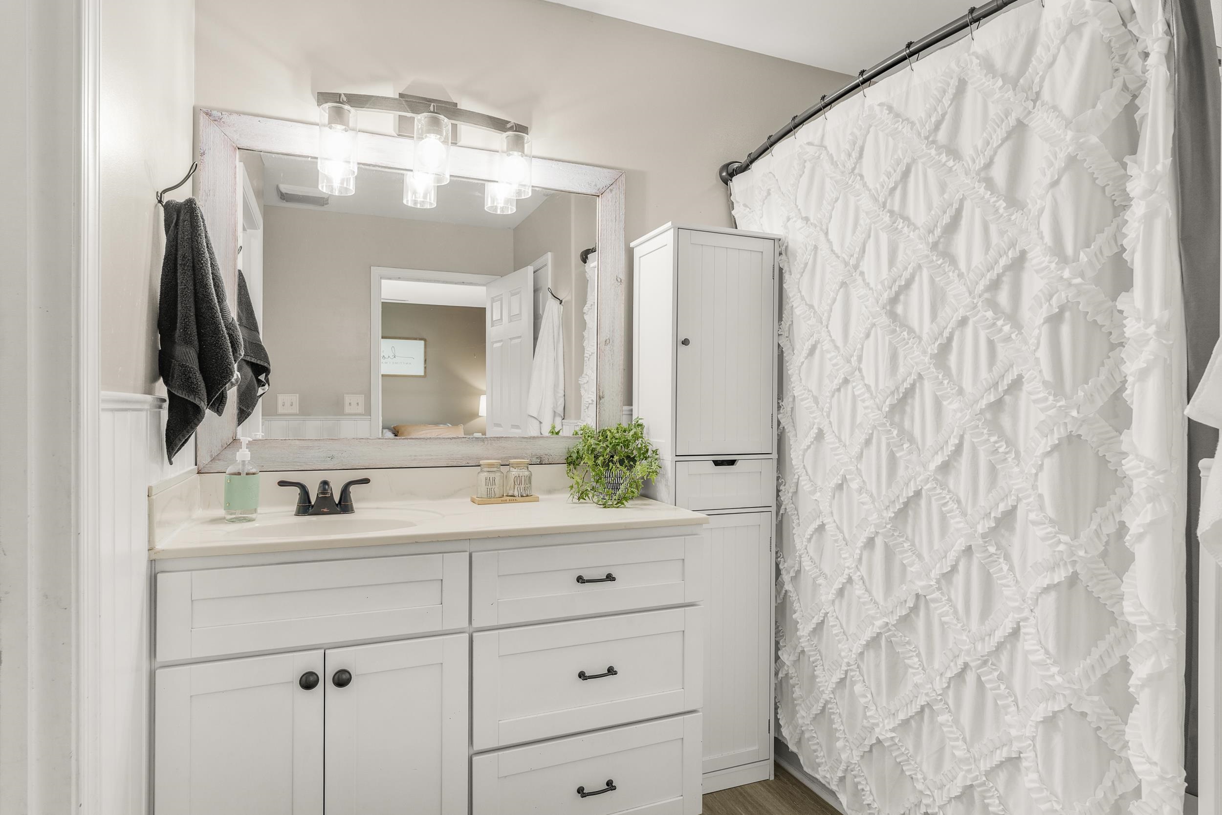 96 Lofty Circle Stuarts Draft, VA 24477 - Photo 24 of 69 a bathroom with a double vanity sink mirror and