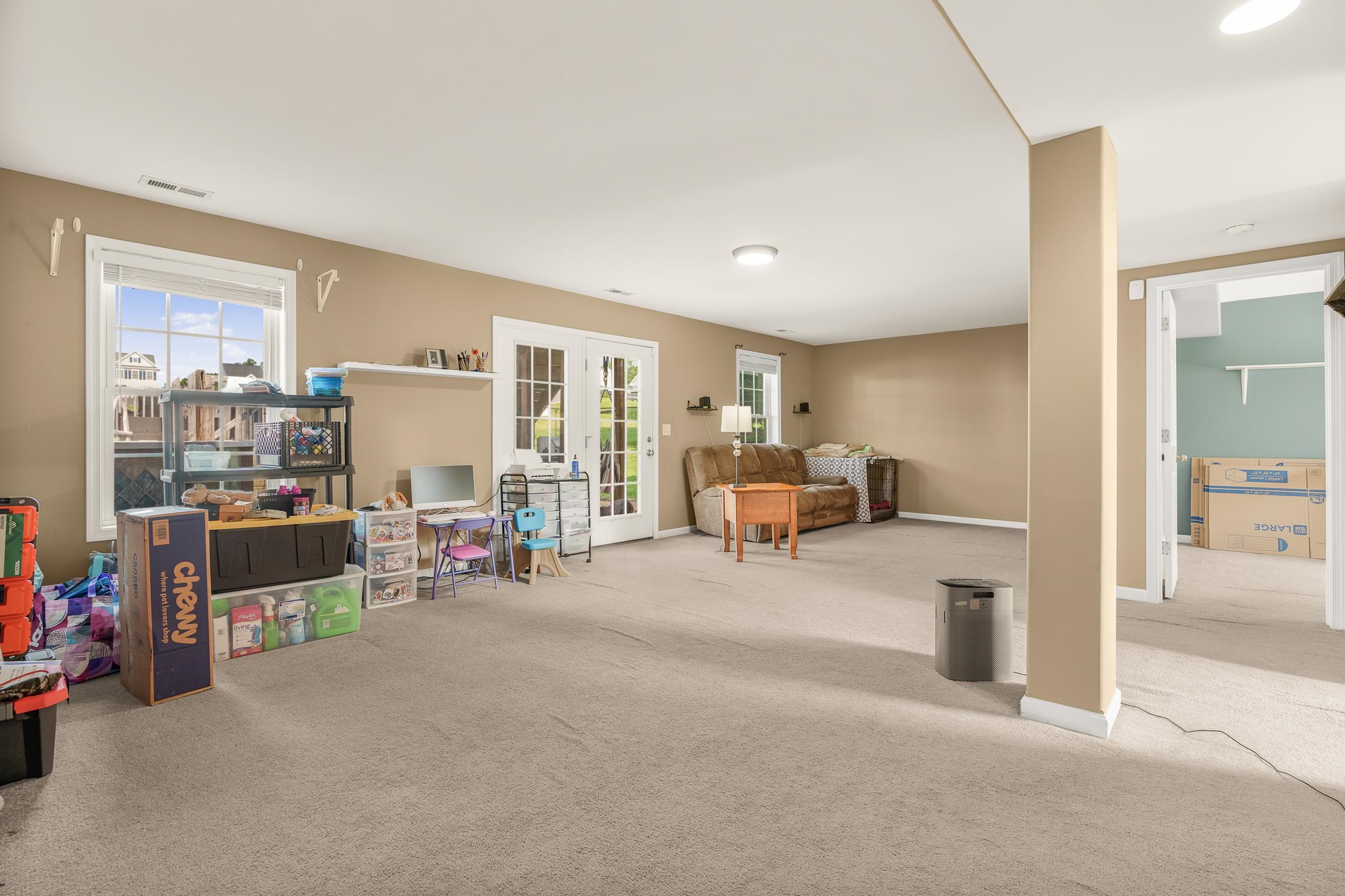 96 Lofty Circle Stuarts Draft, VA 24477 - Photo 34 of 69 a view of a livingroom with workspace and a couch