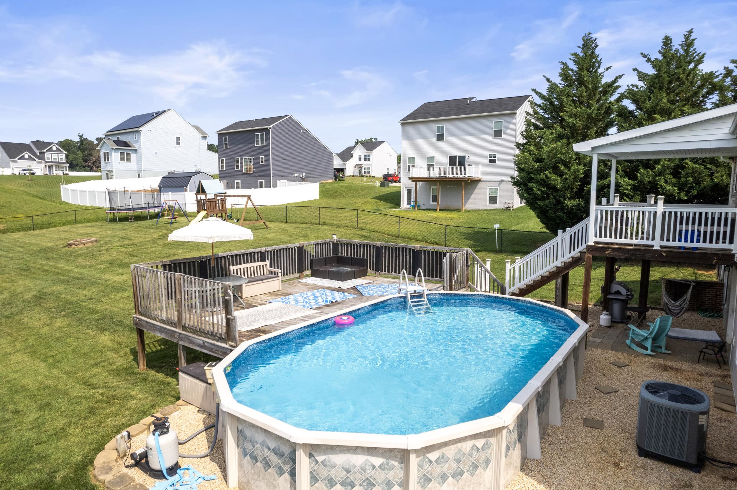 96 Lofty Circle Stuarts Draft, VA 24477 - Photo 46 of 69 a view of a swimming pool with a patio