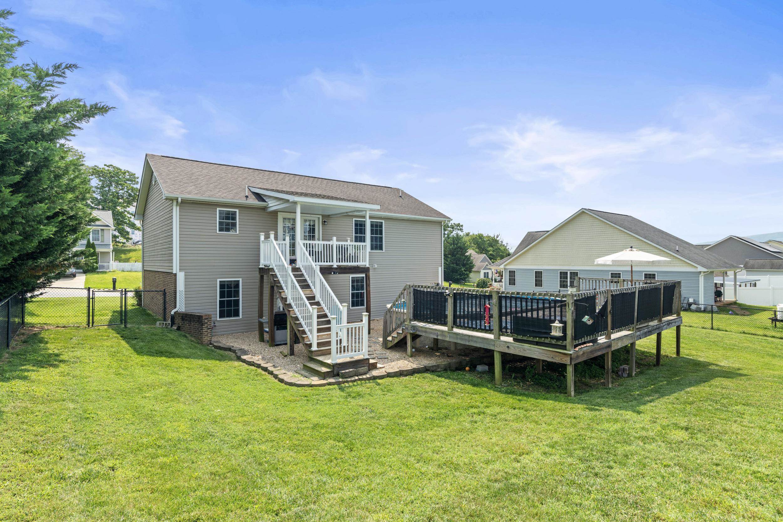 96 Lofty Circle Stuarts Draft, VA 24477 - Photo 49 of 69 a view of a house with a yard patio and slide
