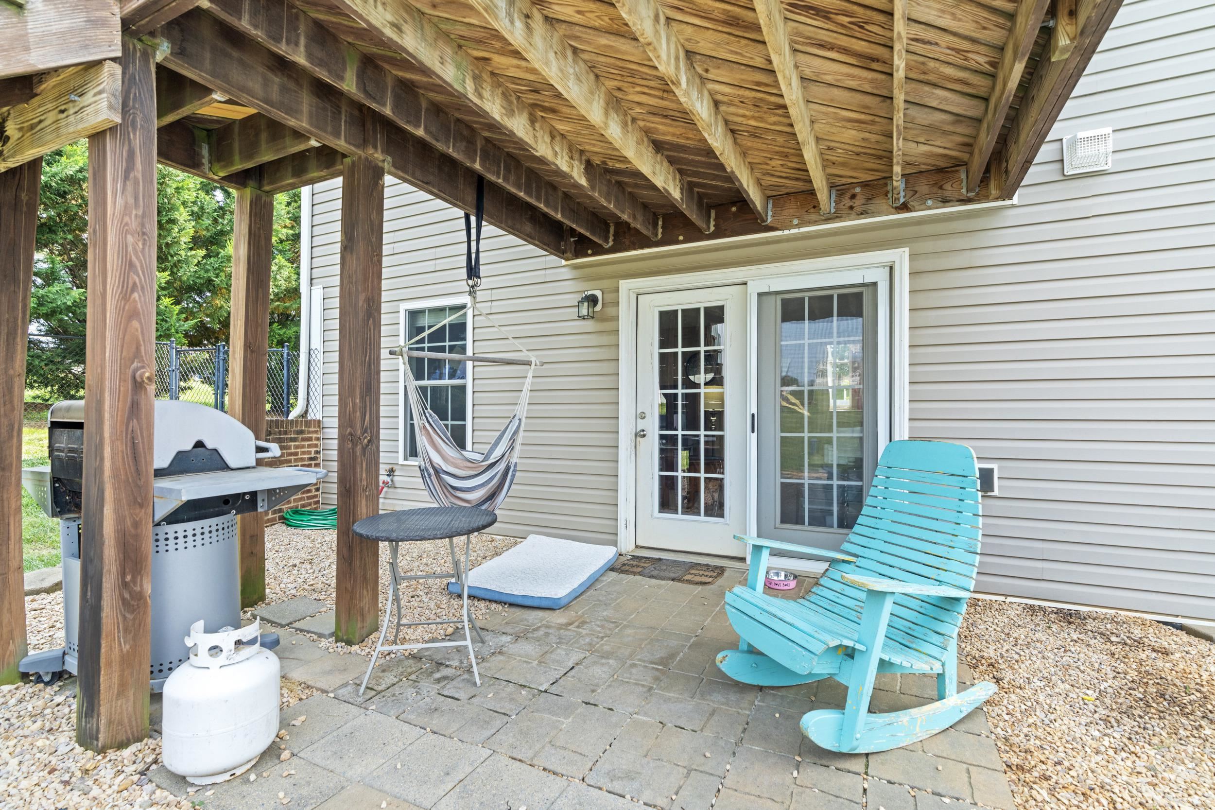 96 Lofty Circle Stuarts Draft, VA 24477 - Photo 54 of 69 a front view of a house with outdoor seating