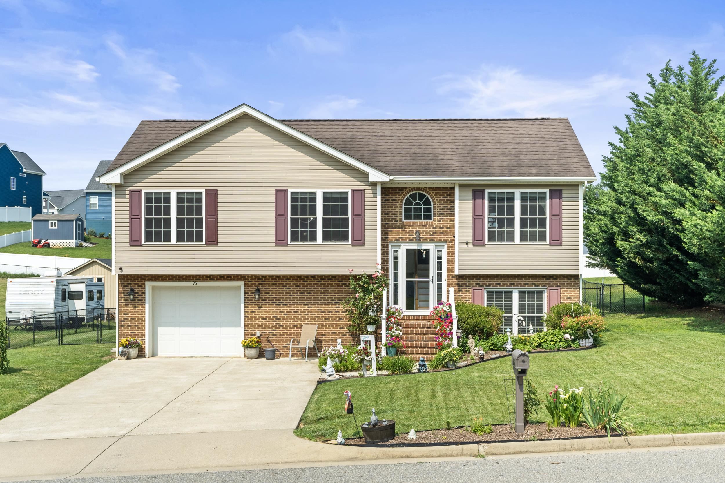 96 Lofty Circle Stuarts Draft, VA 24477 - Photo 69 of 69 a front view of a house with a yard