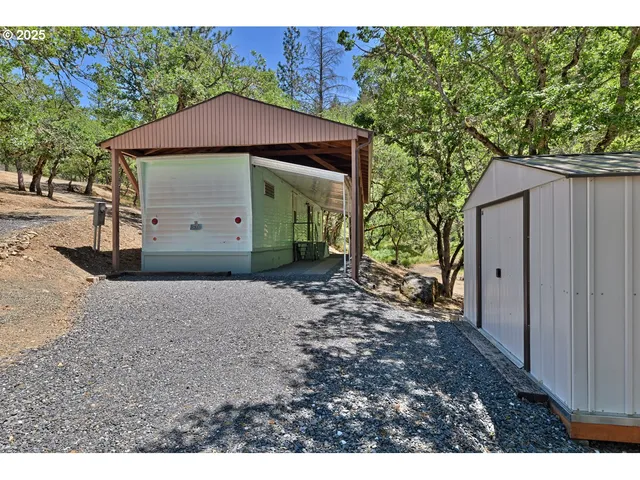 a kitchen with a refrigerator and a cabinets